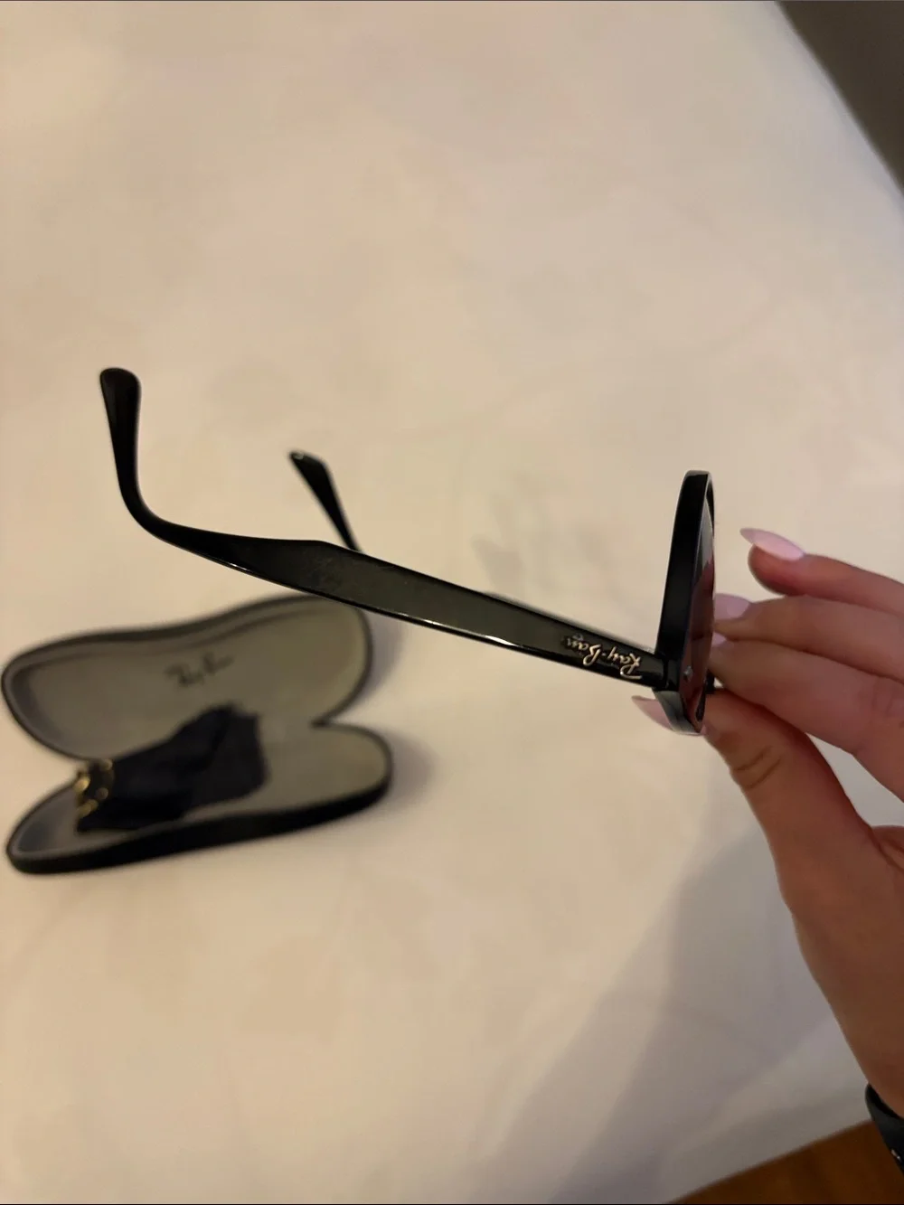 Ray-Ban Black Frame Green Lens Round Sunglasses RB2180